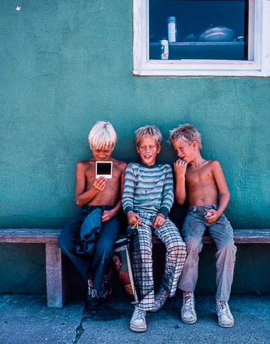 Three Boys and a Polaroid © Jann Alexander